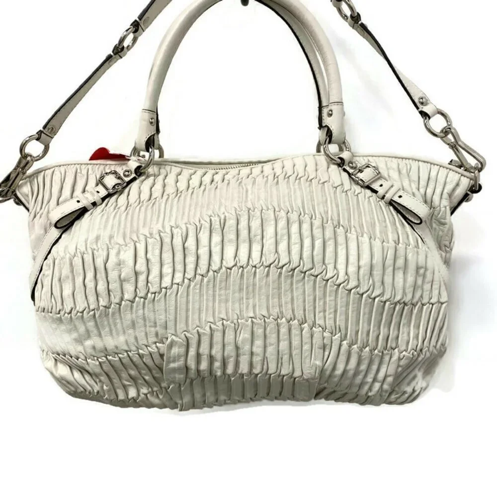 Coach ivory pleated